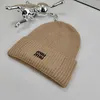 Casquette de baseball de luxe tricotée pour hommes et femmes, bonnet d'hiver avec logo brodé, bonnet d'oie