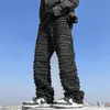 Jeans da uomo Jeans hip-hop bianchi Pantaloni jeans larghi dritti sfilacciati con nappe a righe Harajuku Pantaloni maschili femminili solidi streetwear casual in denim 231026