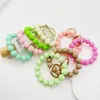 Bracelets de charme Perles de silicone Bracelet porte-clés pour femmes filles Simple Mode Sac Clé Pendentif Couleurs Perlé Bracelet Accessoire