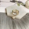 Роскошные дизайнерские ювелирные изделия Высокое качество Золотые кольца с буквами Мужская вечеринка Свадебная пара Одежда Орнамент Обручальные кольца для женщин