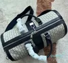 wholesale Large Capacity Duffle Bag Chain Travel Bags Outdoor Genuine Leather Polyester Plain Print Stripes Letter