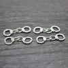 30 pièces lot 31x11mm pendentif à breloque menottes en argent antique 260j