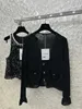 Women's T-Shirt designer 2023 Early Autumn New Cha Small Fragrant Bow with Diamond Buckle Decoration V-neck Ruffle Sleeve Thin Knitted Cardigan YXDM