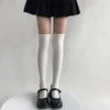 女性の靴下ストッキング日本のファッションソリッドカラー太ももの高いストッキングJKロリータニッティックコットンロング