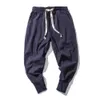 Spodnie damskie Capris bawełniane lniane spodnie haremowe mężczyźni solidne elastyczne talia joggery w lupgy drop-krotki spodnie swobodne spodnie mężczyzn 231026