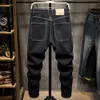 Czarne dżinsy dla mężczyzn luźne fit stretch workowate szerokie legalne dżinsowe spodnie duże streetwearne jean homme modne kowboje