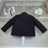 Luxury Lapel Coat för baby dubbelsidig Använd barnjacka Storlek 100-160 Högkvalitativ logotyp Intaglio-knapp Kids outwear Oct25