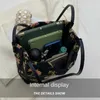 Axelväskor handväskor lyxvarumärke stor blomma handväska 2023 högkvalitativ kvinnors designer och högkapacitet soul bagqwertyui45