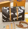 Bolsa de viaje de diseñador Keepall Bandouliere 45 Bolsas de equipaje de lona Hombres Mochila Bolso Mujer Impresión Hombro Crossbody Cuero genuino Letra en relieve Satche