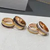 Pierścienie ślubne Sprzedawanie S925 Sterling Srebrny ceramiczny pierścionek zębatkowy dla damskiej mieszanki i meczowej marki modowej luksusowa para biżuteria 231027