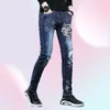 新しい2021年のブランドデザイナーリッピングジーンズ男性オオカミヘッドラグジュアリー刺繍スキニージーンズメンズファッションスリムなハンサムなカジュアルパンツ