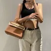 Bolsos de mano de diseñador Bolsos de hombro de moda de lujo Capa Baotou de gama alta TOGO Bolso de cuero de vaca 2023 Nuevo tipo de bolso Bolso de cuero genuino para mujer Temperamento con patrón de litchi BK