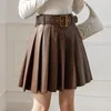 Saias outono inverno jk pu saia de couro mulheres moda coreana cintura alta cinto cor sólida a-line plissado curto mini sexy