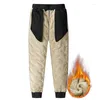 Męskie spodnie 2024 Zime mężczyźni pluszowe grube polarowe spodnie dresowe lambowola termiczne spodnie swobodne wodoodporne wiatroodporne ciepłe bawełnę