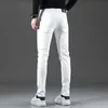 Jeans masculinos designer primavera novo guangzhou xintang algodão salto coreano pés pequenos slim fit high end europeu preto e branco lo fu tau u6cg