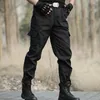 Pantalon d'extérieur noir pour entraînement tactique pour femmes, séchage rapide, coupe-vent, résistant à l'usure, randonnée Swat, engraissement pour hommes
