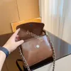 2023 Luxurys Tote Bag Grande Designer Bag Brilhante Couro Bucket Bag Bolsas Mulheres Bolsas Bolsas De Ombro Alta Qualidade NOVO LE Luxurys Bolsas