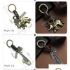 Sleutelhangers Lanyards Mode Autoliefhebbers Paar Sleutelhanger Tassen Muziek Gitaar Olifant Skateboard Hoed Fiets Voor Sleutelhanger Tags Geschenken Drop Dh7Be