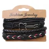 Moda Nuovo 4 Pz / set Chitarra Croce Foglia Fascino Tessuto Braccialetti da uomo in pelle per le donne Homme Femme Gioielli maschili Gioielli di moda all'ingrosso Bracciali fascino chitarra