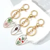 Keychains Oval Flat Pressed Natural Dried Flower Daisy Daffodils Petal Resin Pendant Key Chains Lobster Clasp Ring Bag Auto Holder