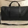 Hot luxe mode mannen vrouwen hoogwaardige reizen plunjezakken merk designer bagage handtassen Met slot grote capaciteit sporttas maat 55 CM