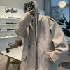 Kurtki męskie wiosna jesienna wełniana z kapturem przystojna High Street Loose Casual Jacket Men Men Tops Overcoat Męskie ubrania