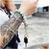 Nouveau Sile Perle Poignet Porte-clés Papillon Bois Camouflage Bracelet Anneau Fabricant Livraison Directe Dhzvu