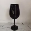 Copos de vinho vendendo temperamento preto vermelho vidro champanhe decoração atmosfera cálice
