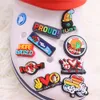 MOQ 20PCS PVC Cartoon Proud Peace Love Lucky Rainbow Hope Four Leaf Clover Tai Chi Buts Akcesoria Dekoracje Dekoracje Burza Uroki dla dzieci