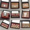 2021 Роскошные дизайнерские кошельки Doraemons Card Wallet Мужчины Женщины Сумки из натуральной кожи Кошелек высшего качества на молнии с карманом для денег с 250S