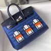 Sacs fourre-tout de créateurs Sacs à bandoulière de mode de luxe 2023 Nouveau modèle de paume avec couche supérieure motif crocodile peau de vache couleur petite maison sac à main BK sac pour femme