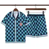 Moda de verano Trajes para hombre Pantalones de playa de Hawaii Conjuntos Camisas de diseñador Camisa de ocio con letras Hombre Slim Fit La junta directiva Manga corta Playas cortas M-3XL