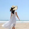Breda randen hattar diskett strand för kvinnor brimta halm damer sol upf 50 foldbar sommar uv hatt resor utomhus