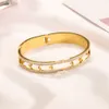 Célèbre Bracelet en or Bracelet de créateur marque lettre femmes Couple Bracelets en acier inoxydable bijoux cadeau