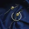 Einzigartige Kupferdraht-Glaskugel-asymmetrische baumelnde Ohrringe für Frauen 2020 Original handgemachte Messing-Vintage-Tropfen-lange lange Ohrringe. Ohrringe