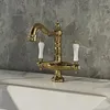 Robinets de lavabo de salle de bains Robinet vintage français Or européen Double poignée en céramique monotrou