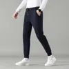 Les derniers pantalons décontractés pour hommes, pantalons sanitaires amples, leggings, nouveaux pantalons, pantalons de sport d'automne et d'hiver épais en peluche résistant au froid pour hommes