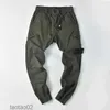 Toppe distintive di alta qualità Pista da uomo Pantaloni di pietra Lettere di moda Designer Jogger Pantaloni Cargo Zipper Fly Pantaloni sportivi lunghi 4homme Abbigliamento Isola 3DVNT