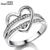 Avec pierres latérales DreamCarnival 1989 romantique femmes anneau creux coeur anneaux pour Couple mariage zircone vente goutte WA11323