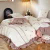 Set di biancheria da letto stile principessa coreana levigatura addensata 4 pezzi autunno e inverno ricamo cotone tessili per la casa commercio all'ingrosso per ragazze