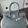 Designer draagtassen Luxe mode Schoudertassen Zilveren knoop buitennaad palmpatroon tas leren handtas mode koeienhuid handtas veelzijdige textuur damestas nieuw