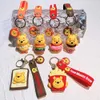 الكرتون حلوى الدب الأصفر دب مفتاح إلغاء الضغط لعبة Bear Bear Keychain Action Action Model PVC Cartoon Bag Doll Doll Toys Gift