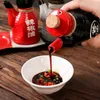 Set di stoviglie Dispenser di liquidi Bottiglia di salsa di soia in ceramica Condimento Contenitore in stile giapponese Pentola per olio Porta condimenti per la casa Barattolo di spezie