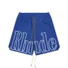 Projektantki szorty Rhude Summer Fashion Beach Pants Men High Quality Street Wear Red Blue Black Purple Mens Short 7P5T