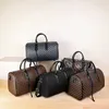 Bolsas Tienda Outlet Business PU cuero suave fitness y viaje versátil bolsa de equipaje de gran capacidad a prueba de salpicaduras