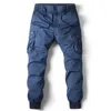 Pantalones para hombres 2023 Ropa de trabajo con cordón de primavera con múltiples bolsillos de gran tamaño suelto casual pequeño pie juvenil