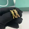 Hotselling anillo de diseñador para mujer anillo de nudo de cuerda de lujo con diamantes anillos de moda para mujeres joyería clásica chapado en oro de 18 quilates boda rosa al por mayor