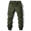 Pantalones para hombres 2023 Ropa de trabajo con cordón de primavera con múltiples bolsillos de gran tamaño suelto casual pequeño pie juvenil