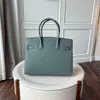 Designer draagtassen Luxe mode Schoudertassen Zilveren knoop buitennaad palmpatroon tas leren handtas mode koeienhuid handtas veelzijdige textuur damestas nieuw