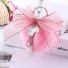 Keychains Luxury Fur Pompom Fluffy Metal Bow Keychain Keyring Diy Bag Charms Handbag Pendant Jewelry Accessories Women Gift Bulk